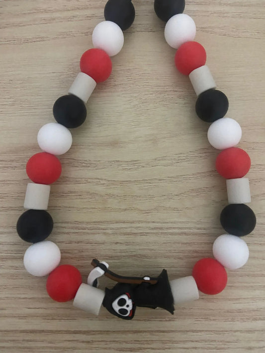 Collier antiparasitaire en perles - faucheuse