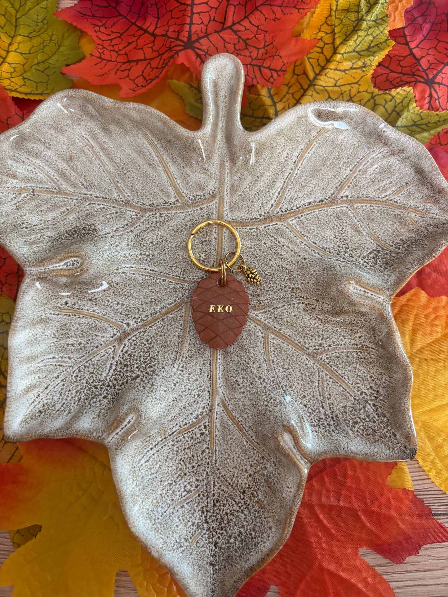 Médaille pomme de pin