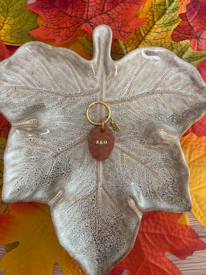 Médaille pomme de pin