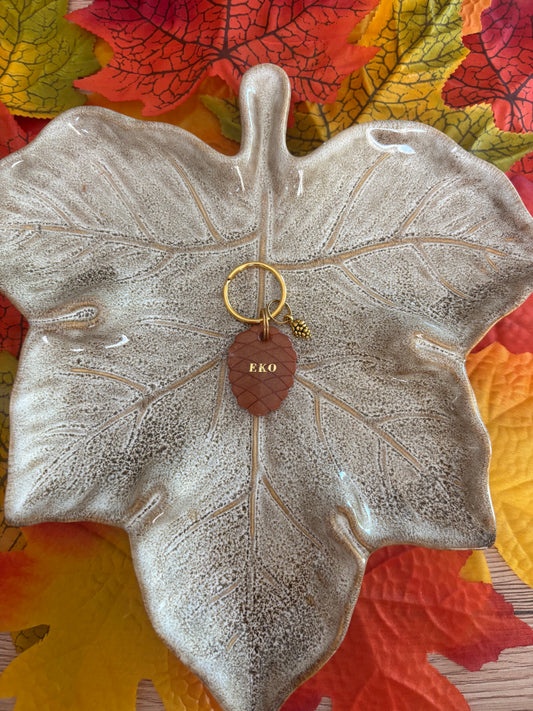 Médaille pomme de pin